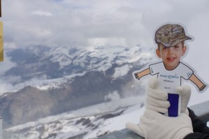 While he didn't make it to the top of Aiguille du Midi, he insisted we take him to the top of the Glacier Mountain Paradise in Zermatt, Switzerland. Although we were not able to get a glimpse of the Matterhorn that day due to poor weather, with a very firm grip, we got this panoramic shot for his Swiss photo album.