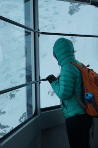 Starring hopelessly out the gondola window at the rain and snow. So much for our hike out.